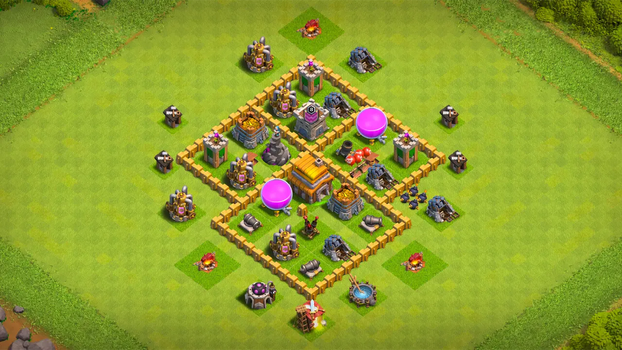 TH5 farming base with centered Town Hall, storages and collectors behind walls, and traps covering both ground and air threats.