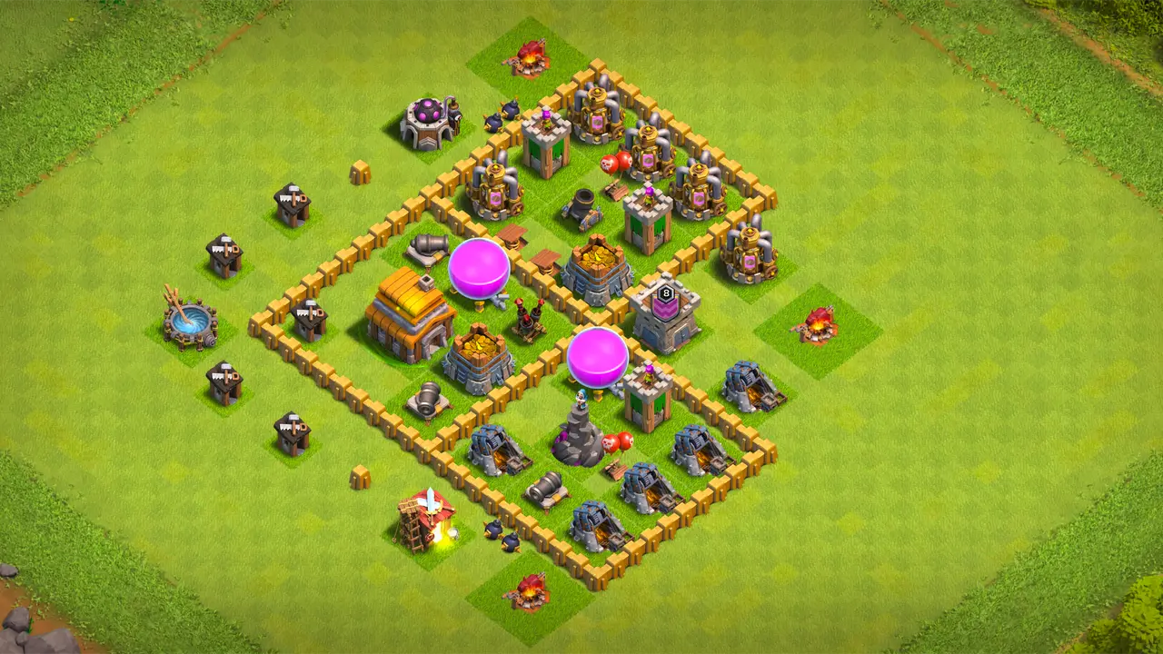 TH5 farming base with three-part box layout, well-protected loot across all sections, and CC troops pressuring attackers mid-raid.