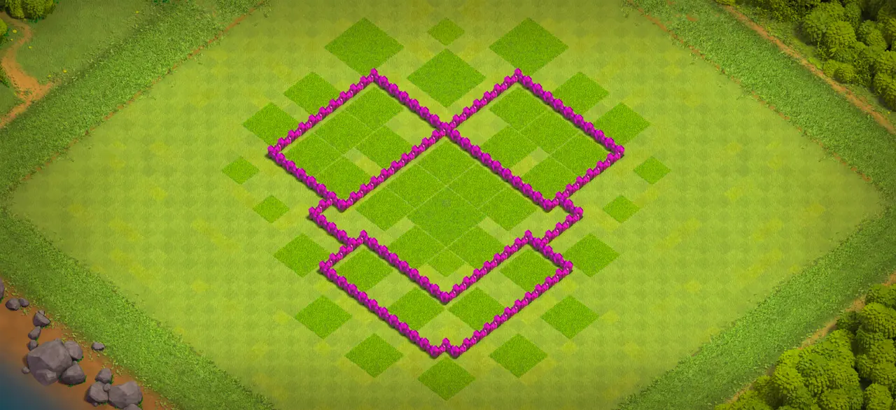 Multiple compartments break ground army funnels, keeping Town Hall locked at the core for a near-guaranteed one-star cap. Storages sit deep inside walls with swap options for extra loot protection. Symmetric layout defends consistently from every angle without weak sides. Tested against Giant+Wizard+Healer and Giant+Wizard+Balloon combos, holds up well even without CC troops. base wall view - wall layout only for clash of clans town hall 6