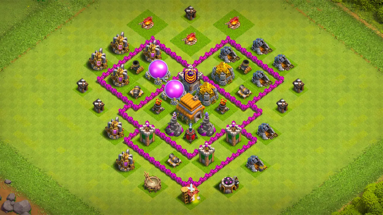 Multiple compartments break ground army funnels, keeping Town Hall locked at the core for a near-guaranteed one-star cap. Storages sit deep inside walls with swap options for extra loot protection. Symmetric layout defends consistently from every angle without weak sides. Tested against Giant+Wizard+Healer and Giant+Wizard+Balloon combos, holds up well even without CC troops. base scout view - full base layout for clash of clans town hall 6