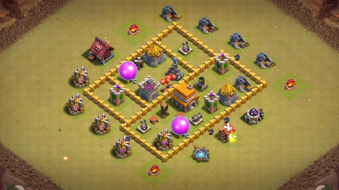 TH5 war base with box layout, Town Hall and Clan Castle at the core, stacked defenses, and CC troops shredding ground pushes.