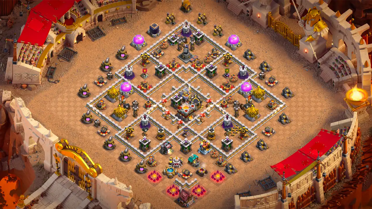 TH11 Anti-2 war base layout in Clash of Clans with the Town Hall and Eagle Artillery in the core, Hero Hunter on top to stop Queen Charge.