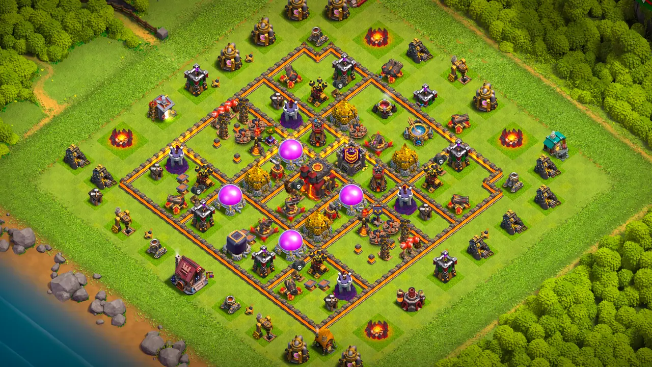 TH10 Anti-2 Farming base layout in Clash of Clans with spread storages in the core, multi-target Inferno and air traps to stop Zap Dragons.