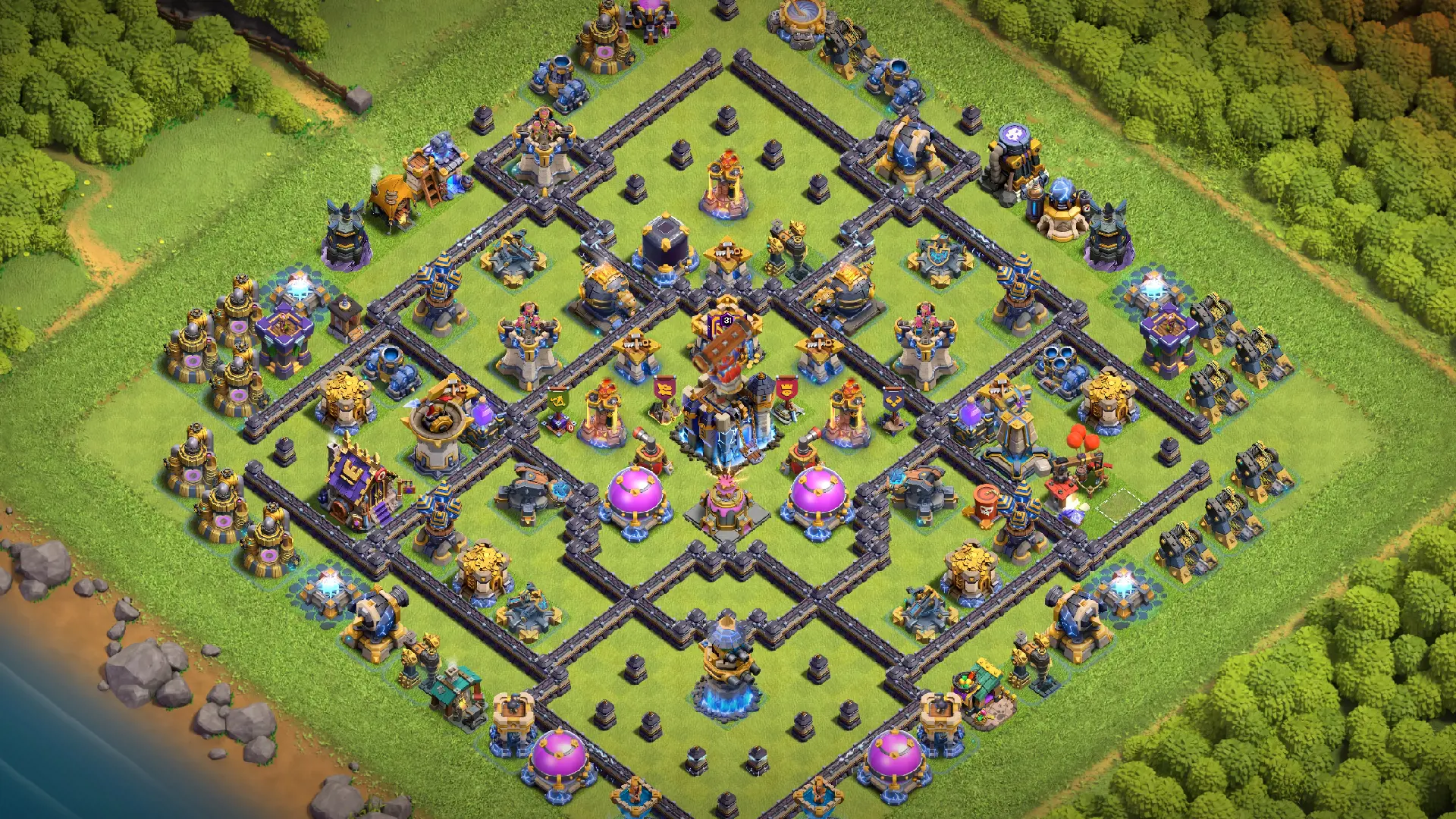 Scout view of the TH18 anti-2 Cake-A-Pult Legend base, with the Revenge Tower behind the core and ground traps at 4 and 8 o'clock.
