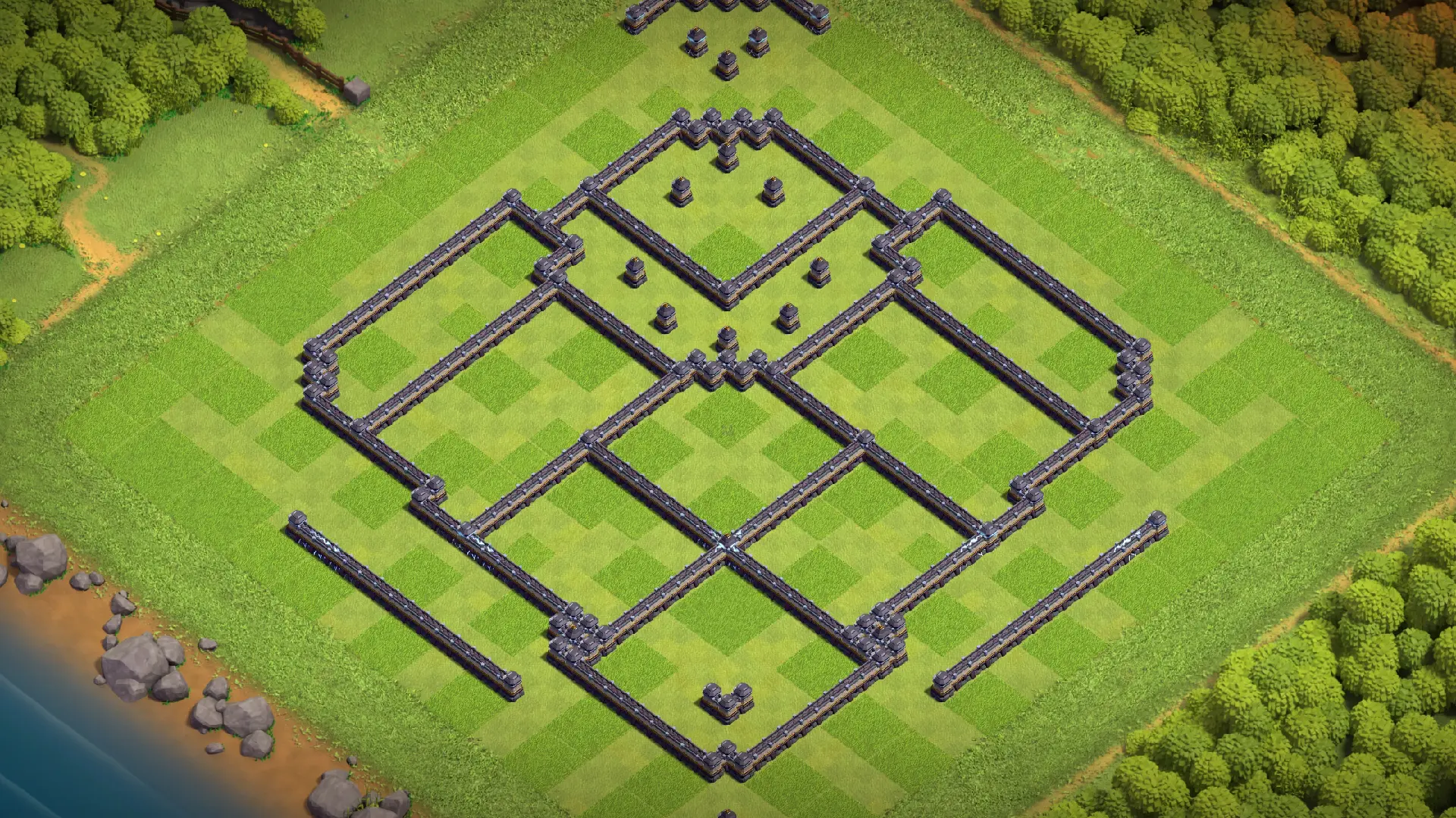 Wall layout of the TH18 anti-3 Hero Hunter ranked base, with heavily baited far-side entries around the Monolith and the Town Hall.
