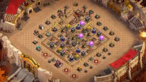 TH10 Anti-3 CWL Base layout with asymmetrical box design, split Infernos, T-shaped Air Defenses, Hound Clan Castle, and compact damage spread for anti–3-star defense.