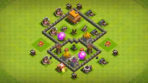TH4 farming base layout in Clash of Clans with split storages and core defenses, Mortar and Air Defense to stop GiBarch and Balloons.