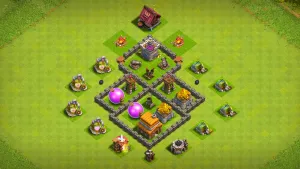 TH4 farming base layout in Clash of Clans with storages split into three sections, Mortar and Air Defense to stop GiBarch and Balloons.