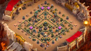 TH17 Anti-2 CWL base layout in Clash of Clans with the Town Hall isolated in the core, Hot Candle and Firespitter to stop blimp attacks.