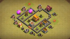 TH4 Anti-2 war base layout in Clash of Clans with a core Town Hall, hidden Mortar and Spring Traps to stop Giant Balloon and GiBarch attacks.