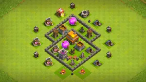 TH4 Anti-2 farming base layout in Clash of Clans with storages in two sections, core Air Defense with Cannons to stop Giant and Balloon attacks.