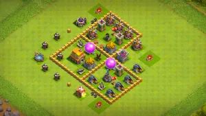 TH5 Anti-3 farming base layout in Clash of Clans with a three-compartment box layout and centered Clan Castle to stop full base rushes.