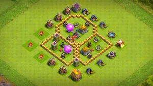TH5 Anti-3 farming base layout in Clash of Clans with storages in three compartments, balanced defenses to stop ground and air attacks.