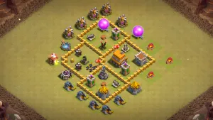 TH5 Anti-3 war base layout in Clash of Clans with an isolated Mortar, Wizard Tower crossfire to stop mixed ground and air attacks.