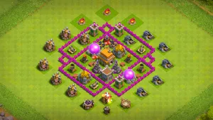 TH6 Anti-2 farming base layout in Clash of Clans with centralized defenses and spread storages to stop Giant-heavy raids.