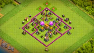 TH6 Anti-2 farming base layout in Clash of Clans with spread Air Defenses and layered traps to stop ground and Balloon-Healer pushes.