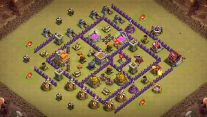 TH7 Anti-Dragon CWL base layout in Clash of Clans with a triangular Air Defense formation to force Dragons to fly sideways.