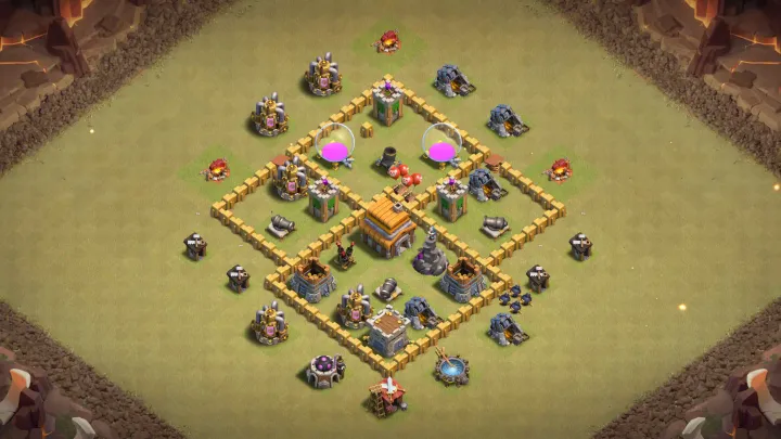 th5 anti-2 war base with four compartments and core Town Hall defended against Balloons and Wizards with direct copy link to your clash of clans