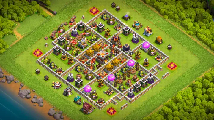 TH11 farming base layout in Clash of Clans with all storages inside the walls, Valkyries and core defenses to stop Sneaky Goblins.